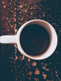 High angle view of coffee cup on table
