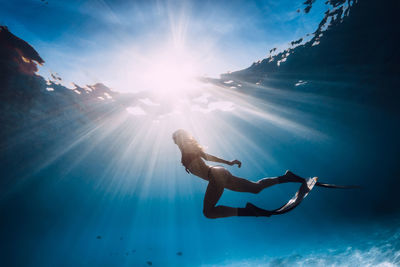 Man swimming in sea