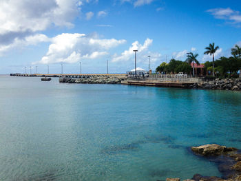 Scenic view of sea against blue sky