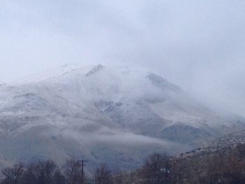 Scenic view of mountains against sky during winter