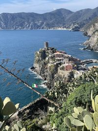 High angle view of townscape by sea against sky - cinque terre