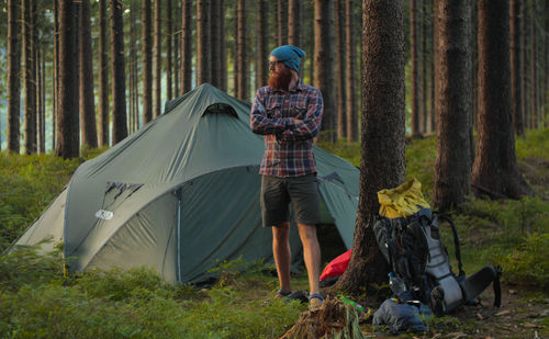 Man camping in forest