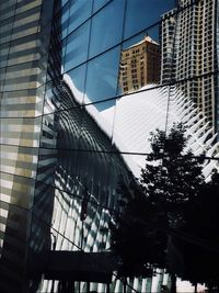 Low angle view of modern buildings against sky