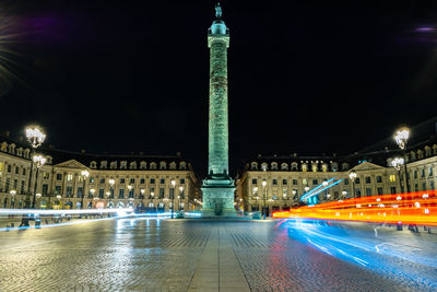 Illuminated buildings in city at night