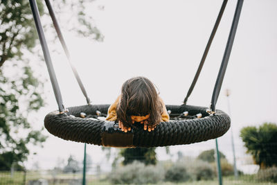 Low angle view of slide against sky