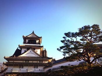 Low angle view of historical building against clear sky