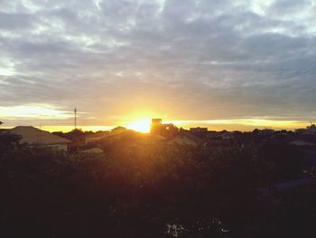 Scenic view of landscape at sunset