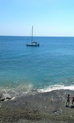 Scenic view of sea against clear sky