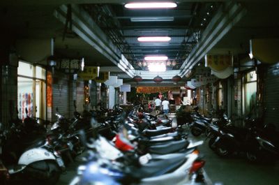 Panoramic view of illuminated cars in city