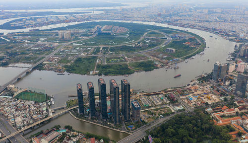 High angle view of river amidst buildings in city