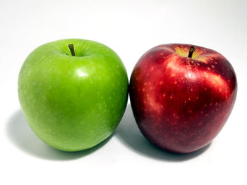 Close-up of apple on white background