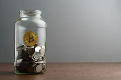 Close-up of glass jar on table