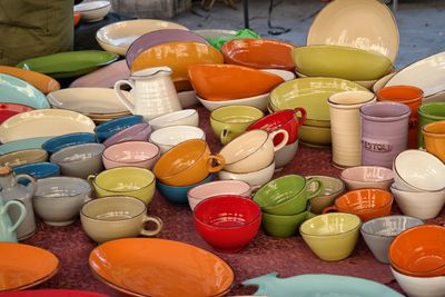 Colorful crockery on table