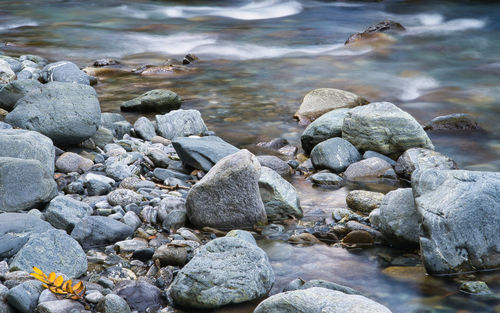 High angle view of stones at beach