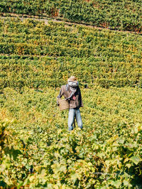 Woman standing in field