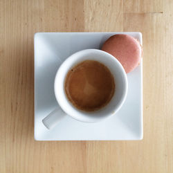 Directly above shot of coffee cup on table