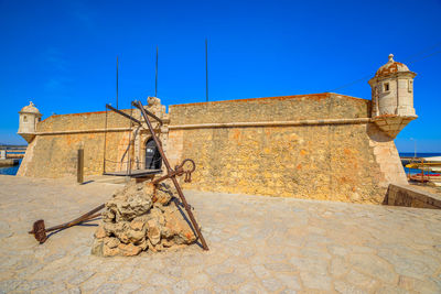 Traditional building against clear blue sky