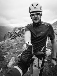 Woman standing on rock