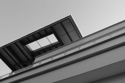 Low angle view of modern building against clear sky