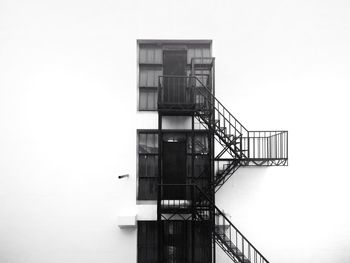 Low angle view of stairs against clear sky