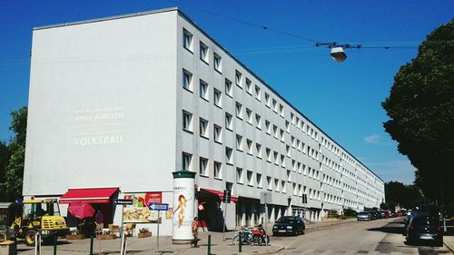 Low angle view of building against blue sky