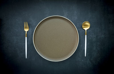 High angle view of coffee on table against black background