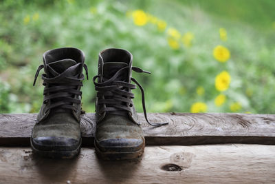 Close-up of shoes on wood