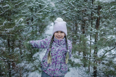 Portrait of smiling girl during winter