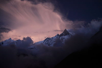 Scenic view of mountains against sky during winter