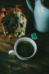 High angle view of tea and cake on table