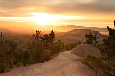 Scenic view of mountains against sky during sunset