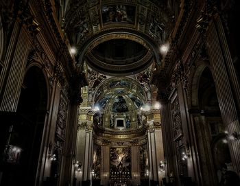 Low angle view of illuminated ceiling of building