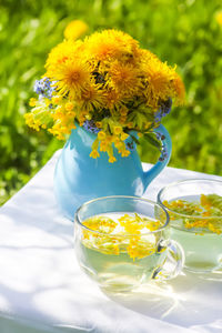 Close-up of flower vase on table