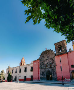 Low angle view of building against clear sky