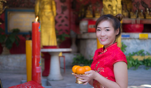 Portrait of smiling young woman