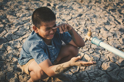 Boy playing in water