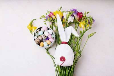 Multi colored flower bouquet against white background