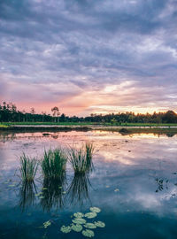 View of lake against cloudy sky