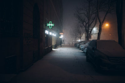 Illuminated street at night