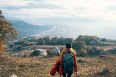 Rear view of man looking at mountain