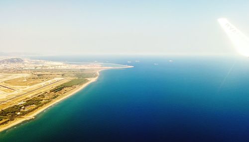 Scenic view of sea against blue sky