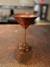 Close-up of wineglass on table