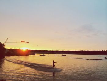 Scenic view of sea at sunset