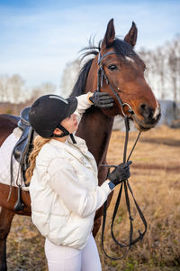 Horse standing on field