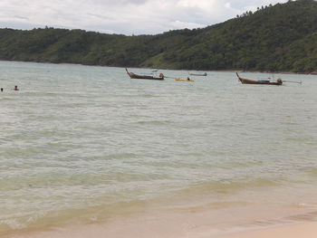 Boats in calm sea