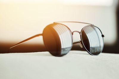 Close-up of sunglasses on table