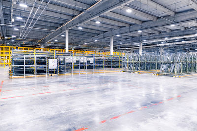 Low angle view of people walking in factory