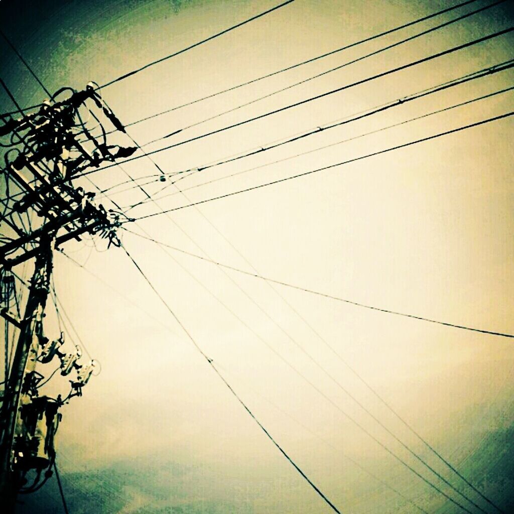 power line, electricity, power supply, electricity pylon, cable, connection, low angle view, technology, fuel and power generation, sky, power cable, complexity, silhouette, no people, dusk, cloud - sky, outdoors, day, nature, wire
