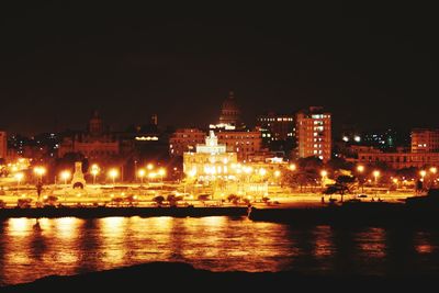 Illuminated cityscape at night