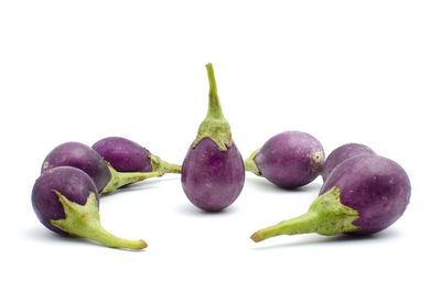 Close-up of fruits against white background